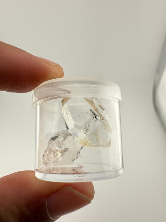Lot of 2 Water Clear Crystals in Container Approx. 7g